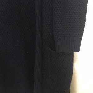 Black knit sweater.